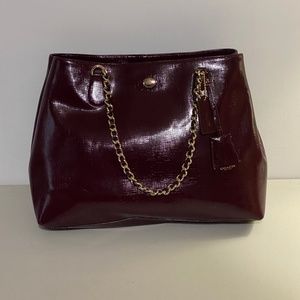 Coach Purse, Burgundy Patent leather with a gold chain and burgundy strap